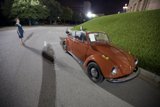 Nighttime Stroll in a Vintage Convertible