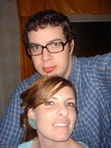 Couple Poses Together for Casual Indoor Portrait