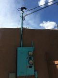 Blue Electrical Box on a Cloudy Day