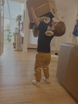 Child Plays with VR Headset at Home