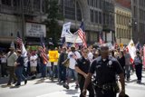 American Flags wave through the Metropolis
