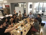 Friends Decorating Mini Pumpkins at Office Halloween Party
