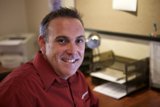 Happy Man at Hardwood Office