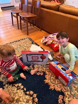 Holiday Morning Gift Opening with Two Young Brothers