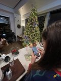 Phone Check in a Festive Dining Room