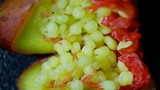 Macro Close-Up of Exotic Fruit Seeds and Flesh