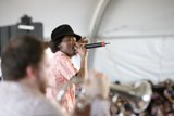 K'naan Warsame wows the crowd at Coachella 2009 with fedora and microphone