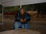 The Woman on the Plywood Bench
