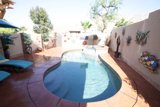 Relaxation in the Villa's Poolside Paradise