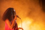 Solange Profile Singing Hair Cascading Golden Orange