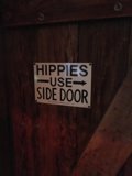 Hippies Know the Way: Wooden Sign Leads the Path