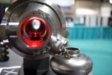Red-Lit Rotor Coil in Super Computing Manufacturing Lab