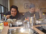 Friends Sharing a Delicious Stew