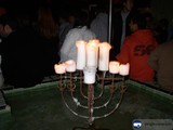 Lighting the Hanukkah Menorah in the Pool