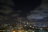 Urban Metropolis under Nighttime Storm