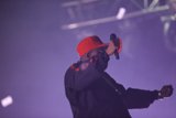 Man in Red Hat Rocks the Stage