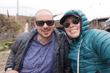 Couple in Puffy Jackets Enjoying Outdoor Adventure