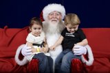 Santa Claus spreading joy among children