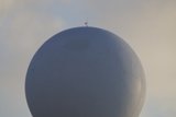 The Cosmic Game: Earth's Grand Soccer Ball