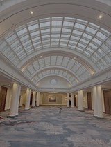 Grand Barrel-Vaulted Atrium with Glass Ceiling