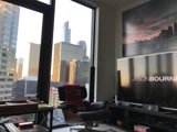 Living Room Entertainment Center with Large Window View