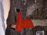 Woman in Red Coat at Famous Gum Wall