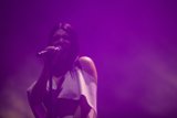 Solo Performance in Purple Lighting