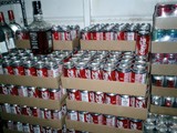 Coca-Cola Cans Piled High in Warehouse