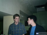 Two Men Deep in Conversation