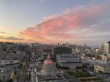 Pink Clouds over Urban Skyscrapers