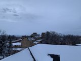 Serenity on a Snowy Rooftop