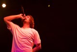 Aesop Rock Takes the Stage with Microphone in Hand