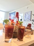 Two Glasses of Bloody Cocktails on a Desk