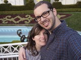 Couple Smiling Together at Decorated Garden Venue