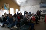 Impatient Audience Waits in Crowded Room