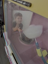Child Enjoying Interactive Science Museum Exhibit