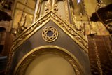 Gilded Timekeeper at the Church