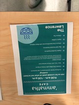 Ammatha Cafe Menu Displayed on Wooden Table