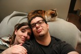Cozy Couple Selfie with Calico Cat Companion