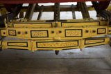 Yellow Wagon with Black and Red Designs