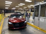 Red Sports Car in Parking Garage