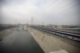 Traversing the River: A Train Journey