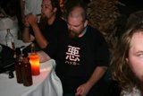 Bearded Man Enjoys Beer with Friends at Pub