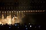 Kanye West Arm Raised Wave