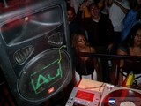 DJ spinning at a club party