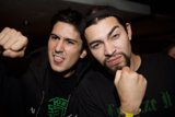 Two Men Posing for a Picture at a Party