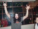Long-haired Man at the Nightclub