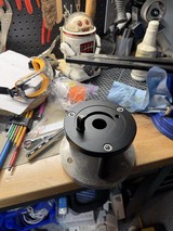 Custom Machined Adapter Mount on Workshop Bench