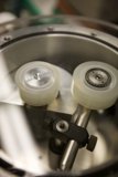 Two Spoked Wheels on Machine