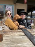 Rhoda and Lori's outdoor coffee with furry friend